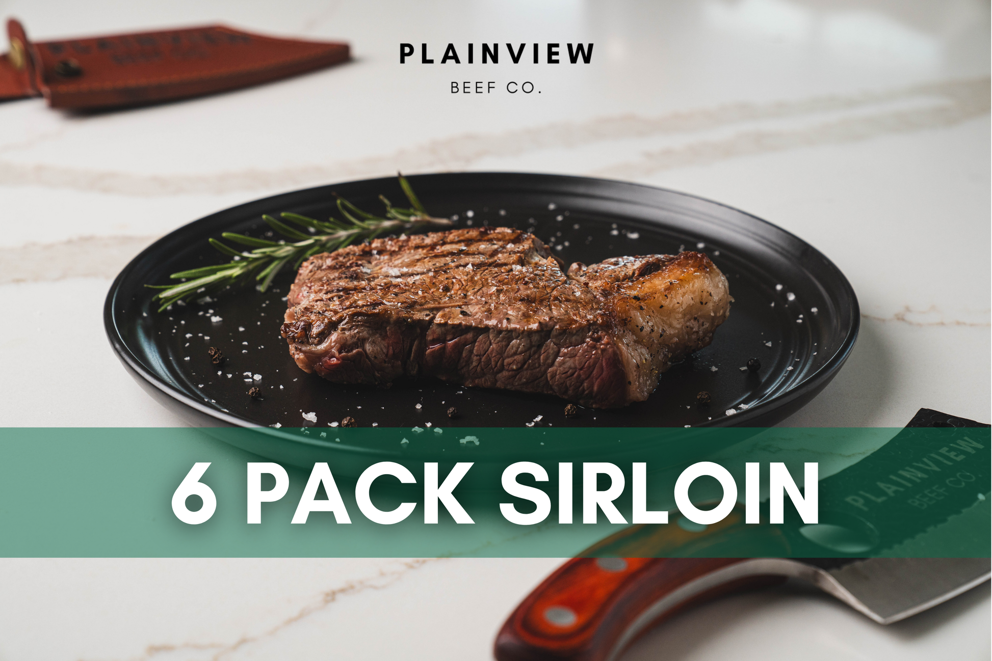 Seared Kansas sirloin steak on plate with rosemary – premium sprout-finished beef.