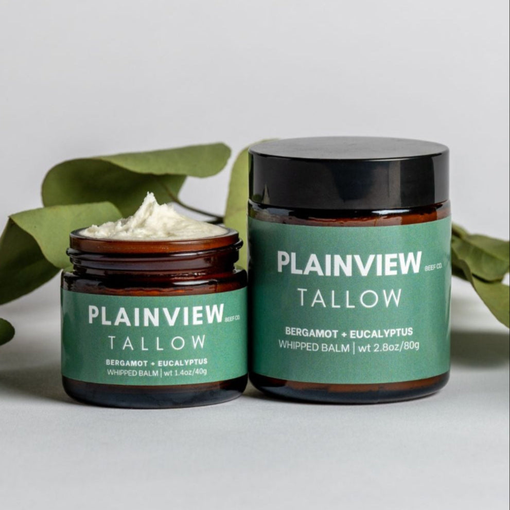 Jars of eucalyptus and bergamot tallow balm – natural spot treatment and redness relief.
