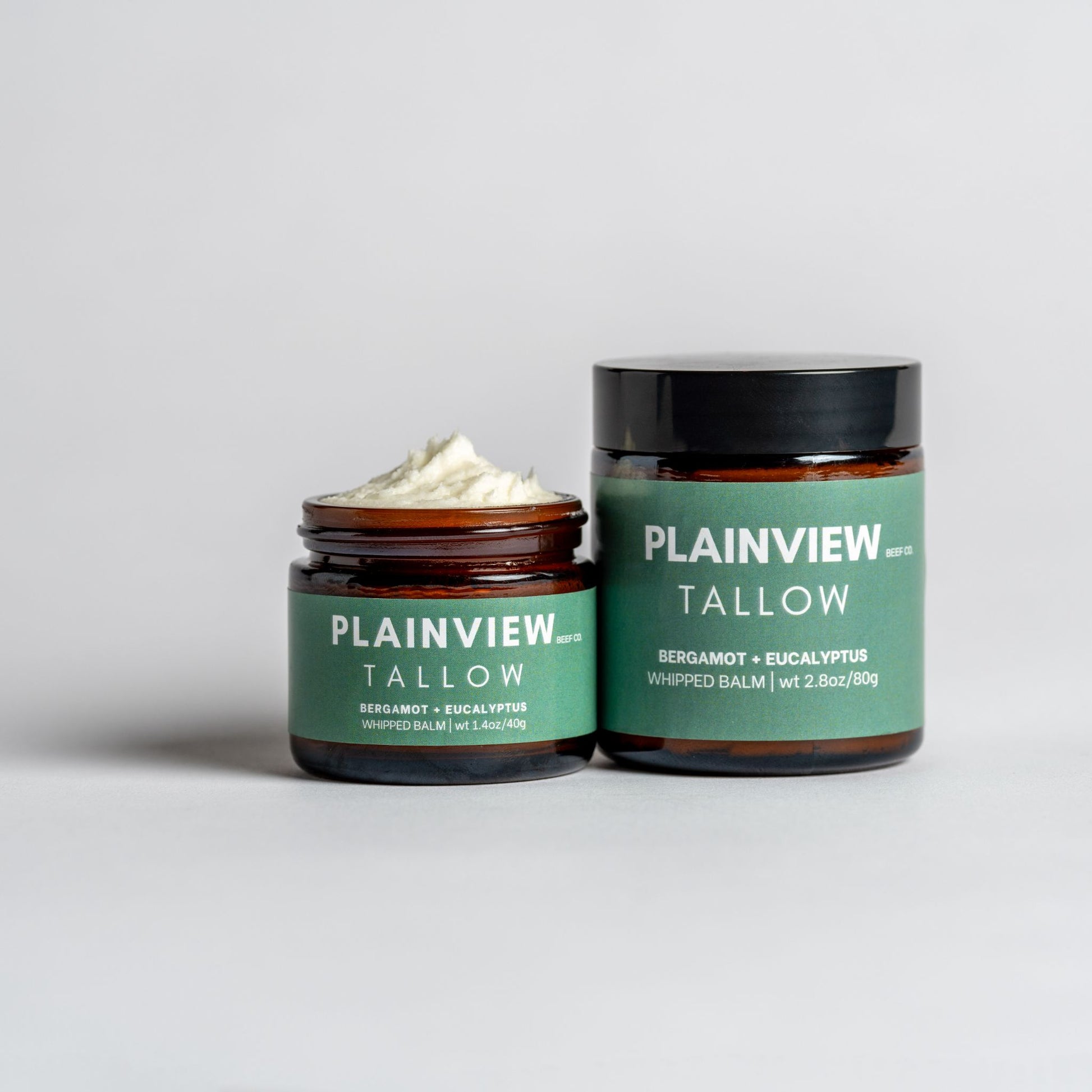 Jars of eucalyptus and bergamot tallow balm – natural spot treatment and redness relief.
