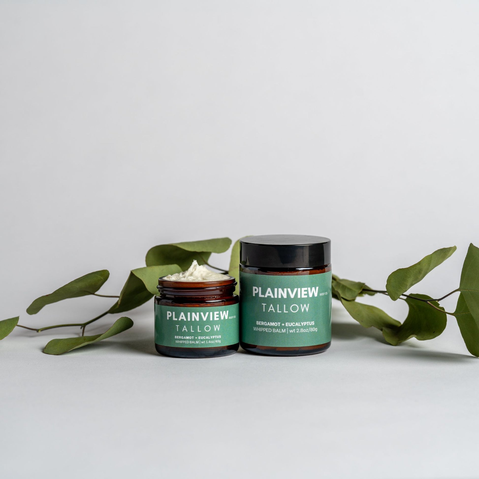 Jars of eucalyptus and bergamot tallow balm – natural spot treatment and redness relief.