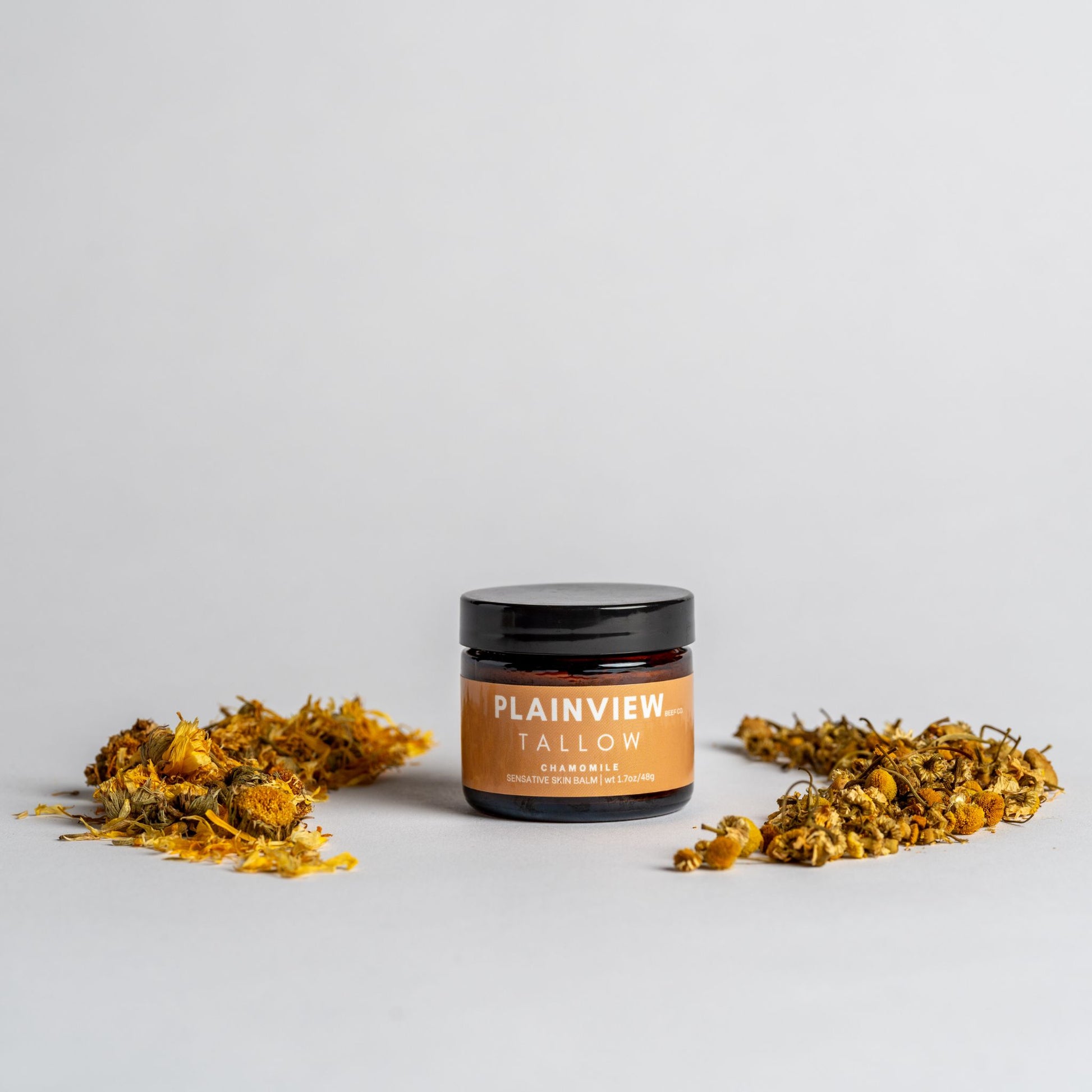 Jar of chamomile tallow balm – natural baby-safe and pregnancy-safe skincare.