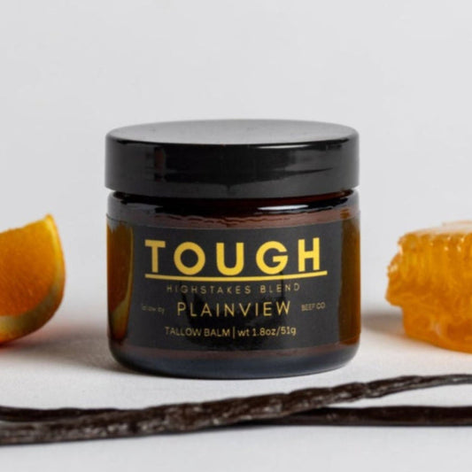 Jar of 'Tough' balm with oranges and vanilla beans