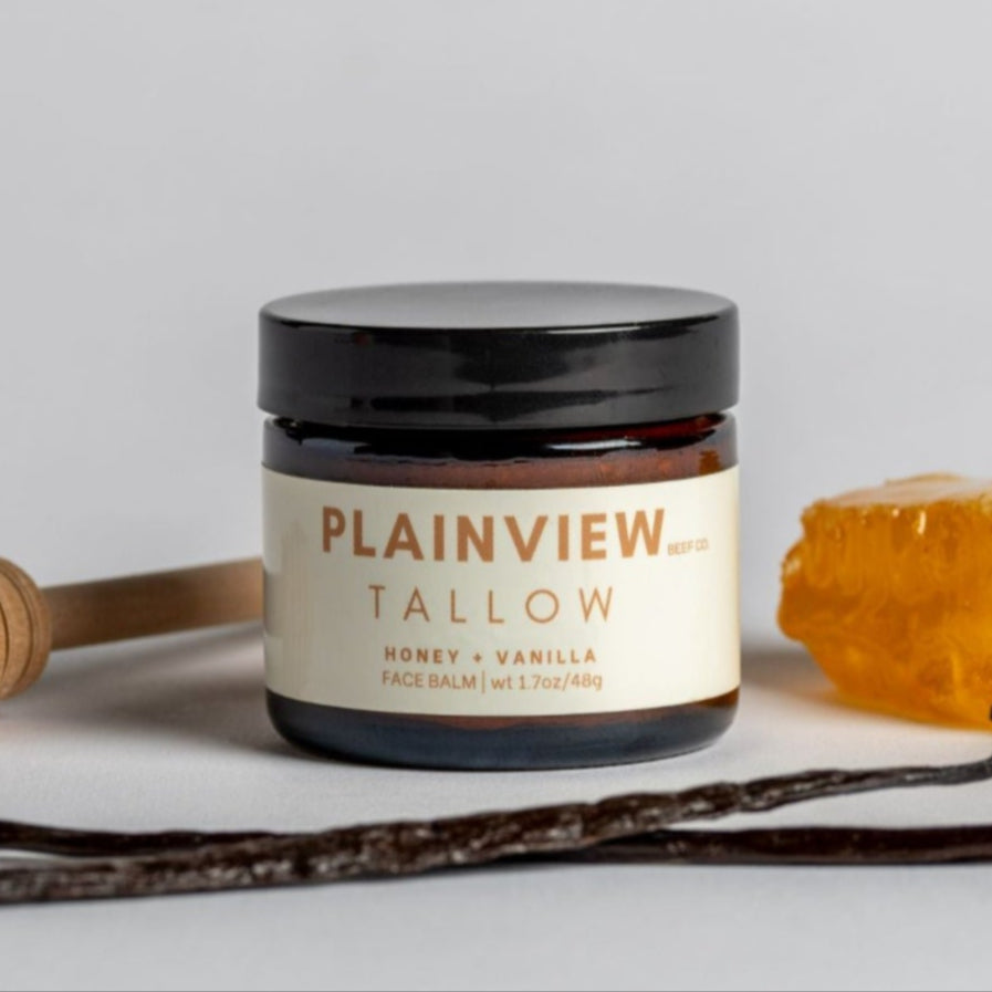 honey and vanilla tallow jar with honey, vanilla bean, and honeycomb