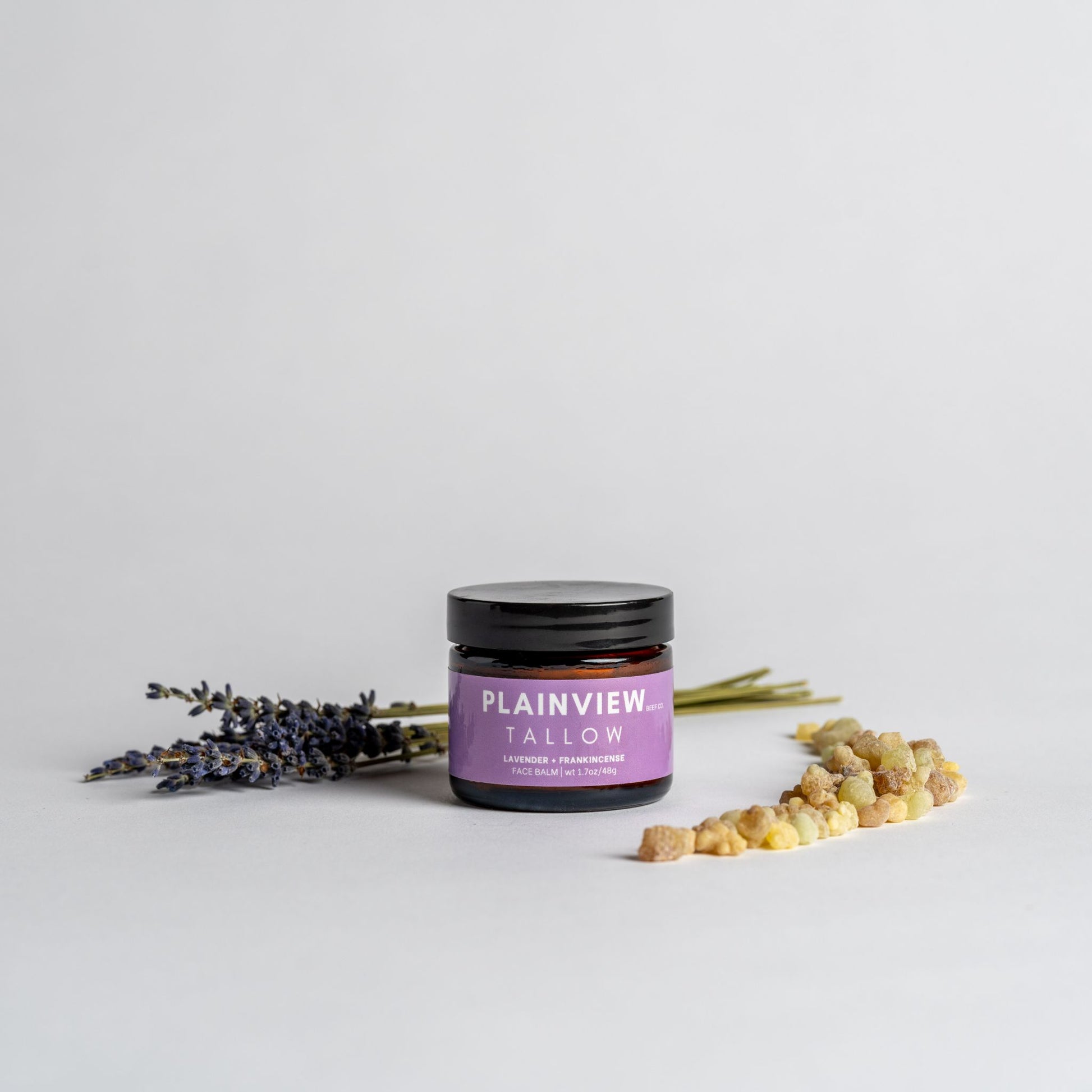 lavender and frankincense tallow face balm jars with lavender and beeswax