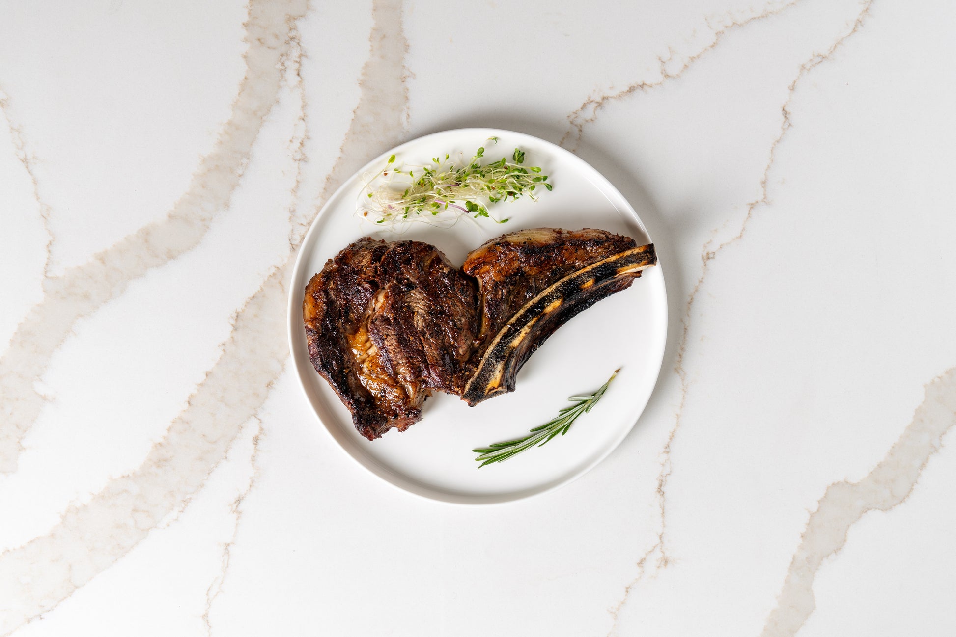 Seared ribeye steak – premium Kansas cut on plate