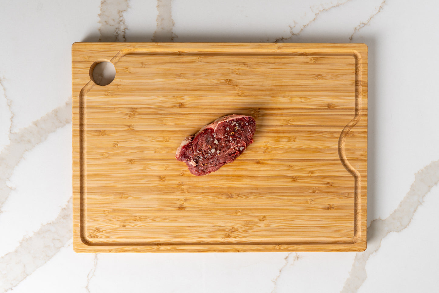 Tender nutrient-optimized filet steak on wooden board