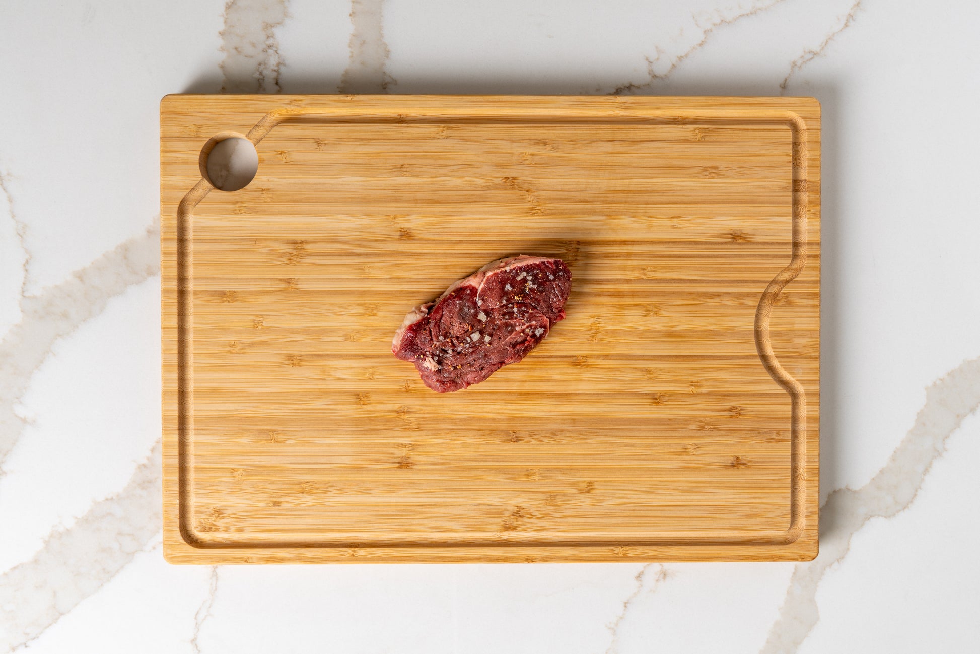 Tender nutrient-optimized filet steak on wooden board
